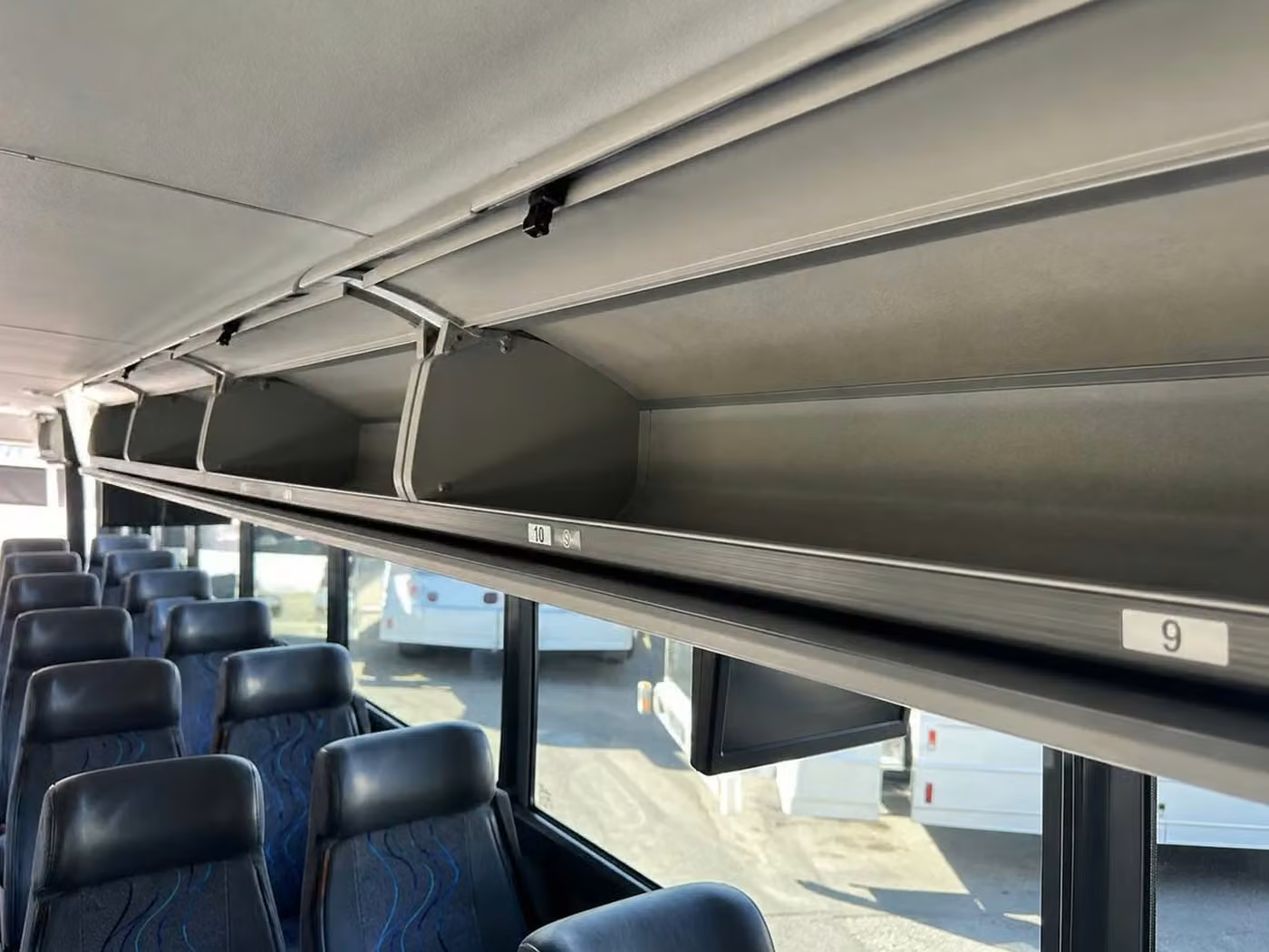 enterprise 18 passenger minibus overhead storage