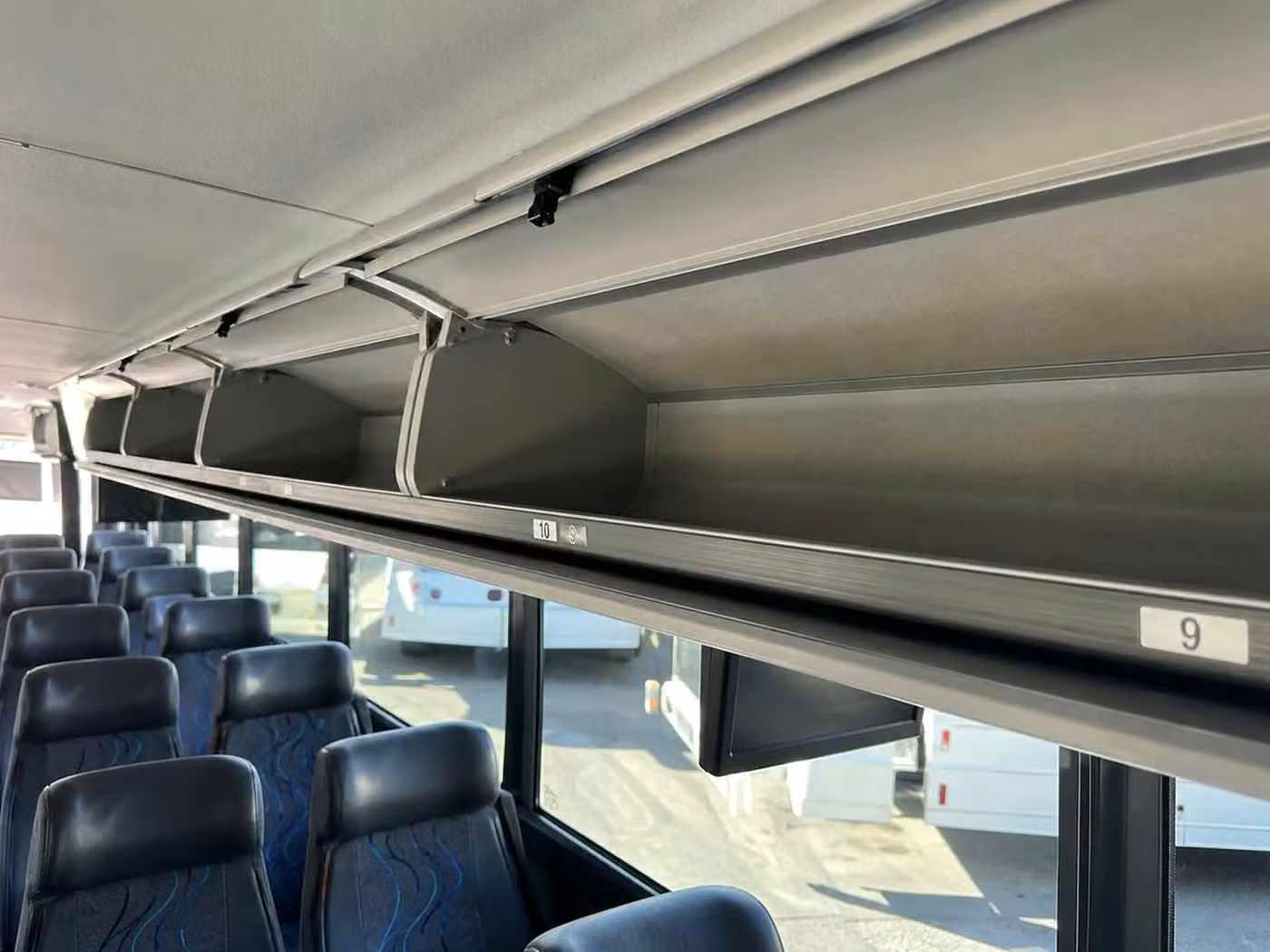 enterprise 25 passenger minibus overhead storage