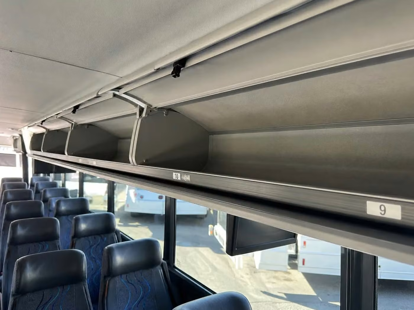 enterprise 28 passenger minibus overhead storage