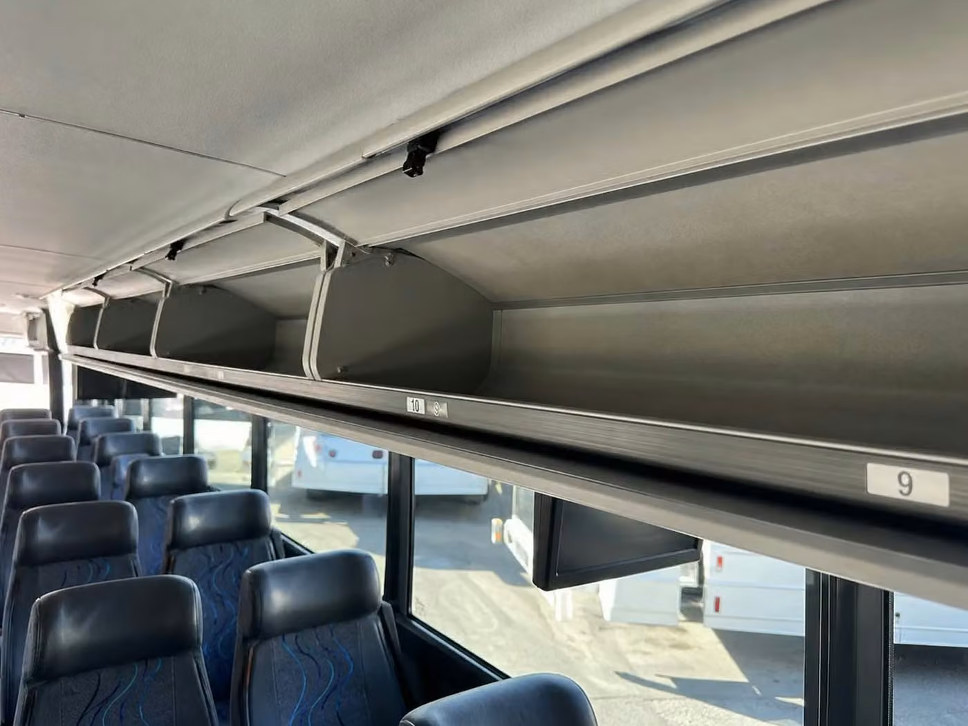 enterprise 35 passenger minibus overhead storage