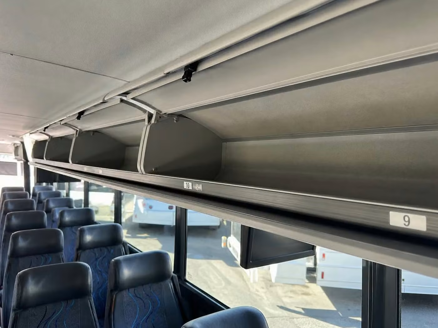 enterprise charter bus overhead storage